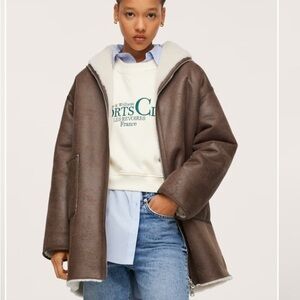 Reversible brown and tan sherrling coat